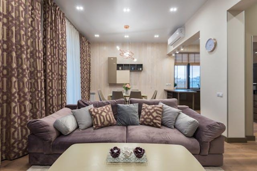 living room with large couch in center